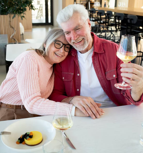 Two seniors chatting over coffee